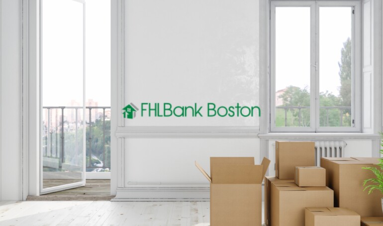 FHLB Boston logo over room with moving boxes