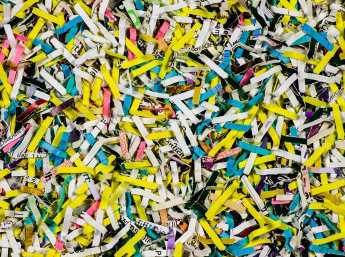 pile of shredded paper of all colors