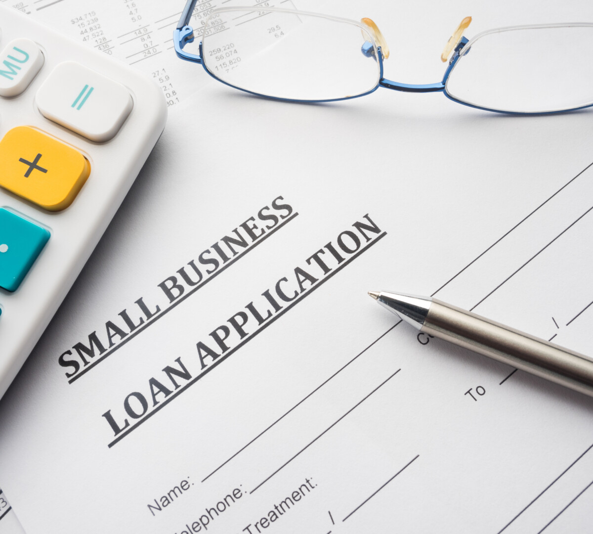 Small business loan application on a desk.